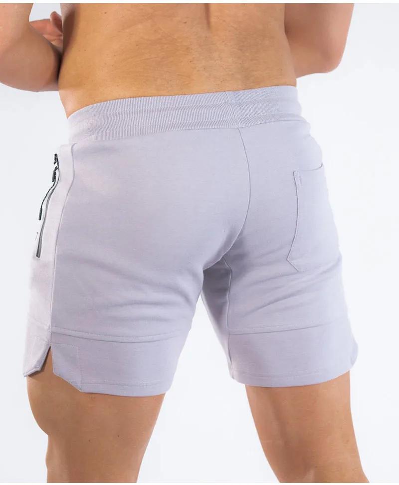 2024 nouveaux shorts de sport hommes shorts de plage pantalons de poche zippée pantalons de survêtem