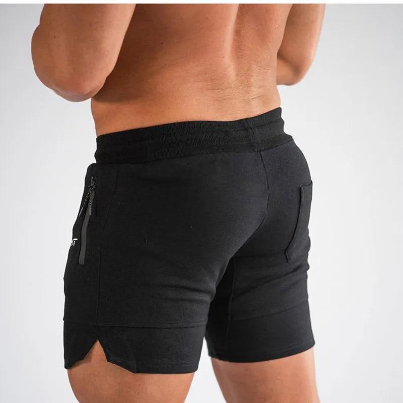 2024 nouveaux shorts de sport hommes shorts de plage pantalons de poche zippée pantalons de survêtem
