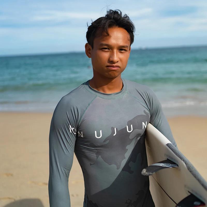 Maillot de bain manches longues homme protection UV rash guard surf plage natation