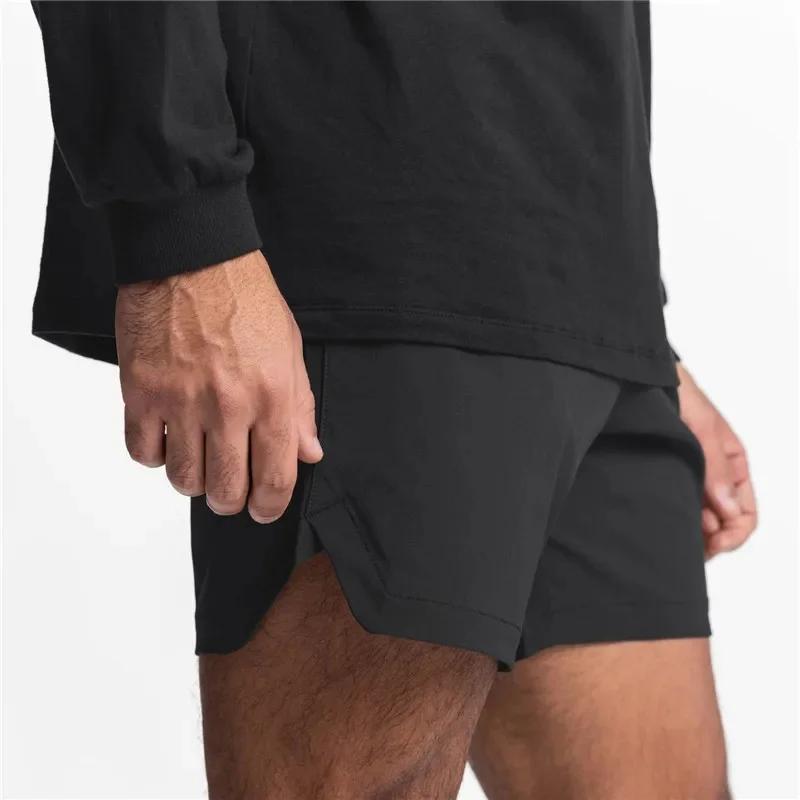 Nouveaux hommes course séchage rapide Fitness gymnases Shorts hommes été pantalons courts mâle survê