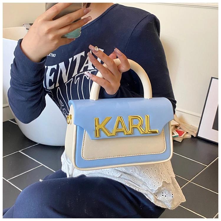 Sac à couches haut de gamme tendance avec une finition soignée et des couleurs assorties à la mode, 
