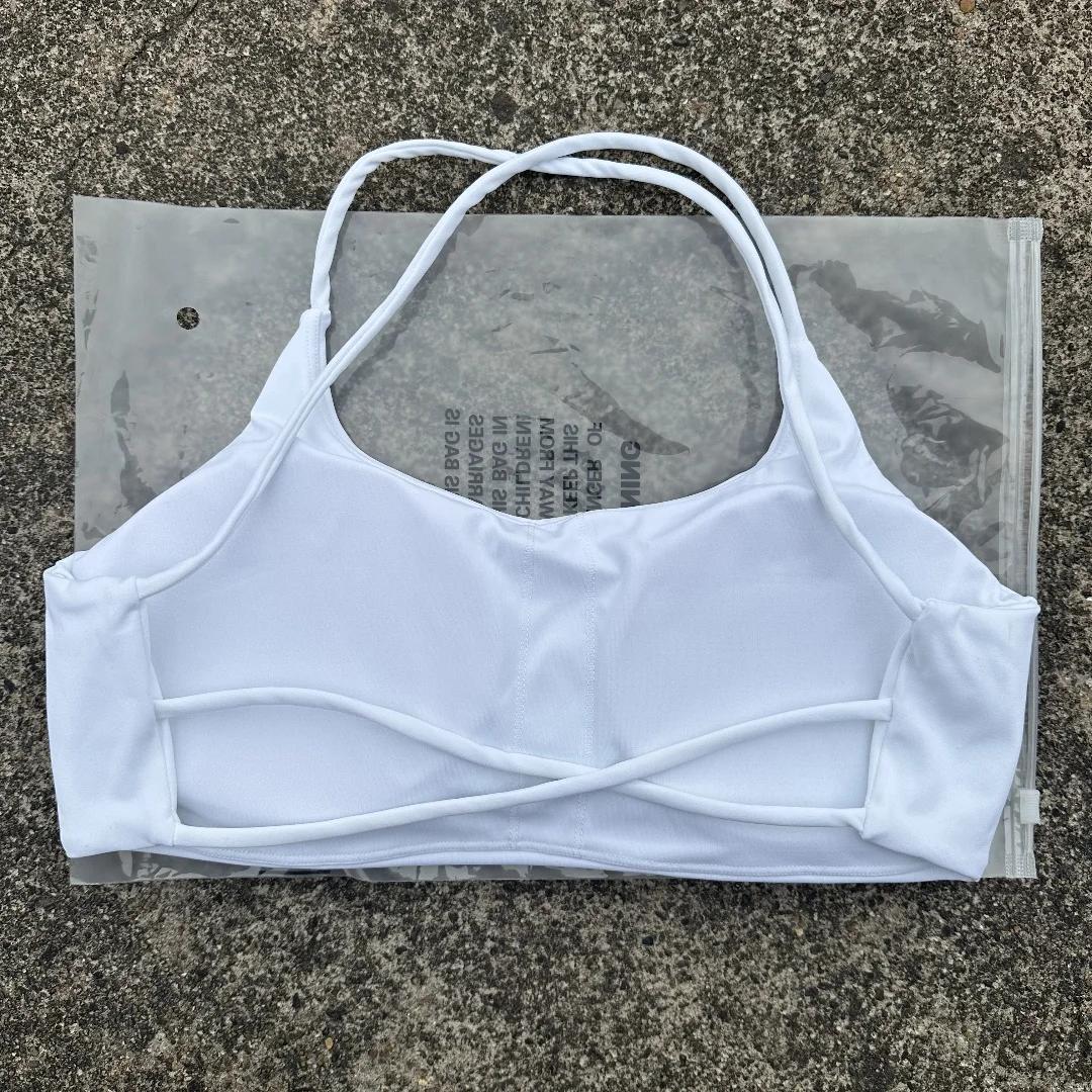 Soutien-gorge de fitness pour femmes couleur unie - Haut serré avec dos croisé et push-up pour l'entraînement complet