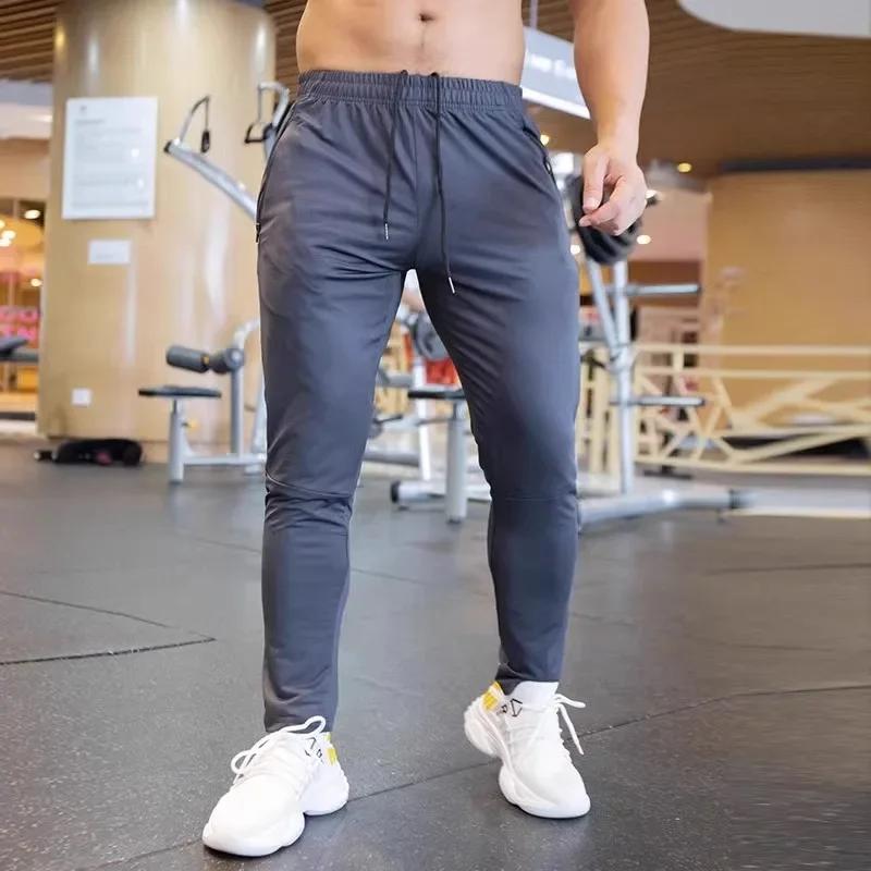 Pantalon automne respirant homme - Tenue course sportive à séchage rapide avec poches zippées