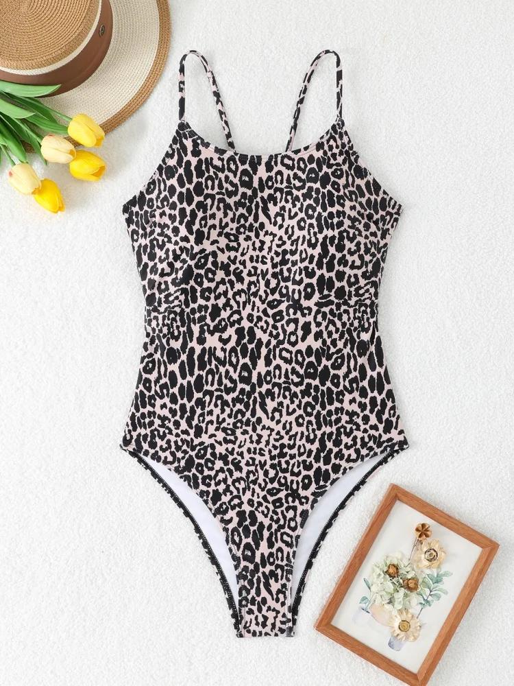 Maillot de bain une pièce femme 2026 - Modèle uni sexy à bretelles et découpes dos nu pour l'été