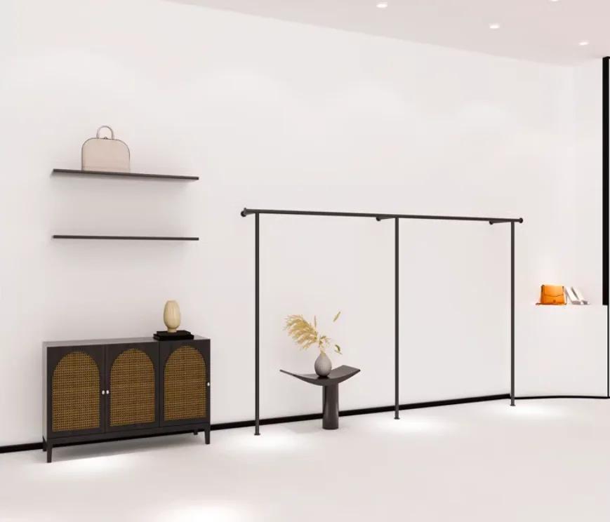 Présentoir mural pour magasin de vêtements