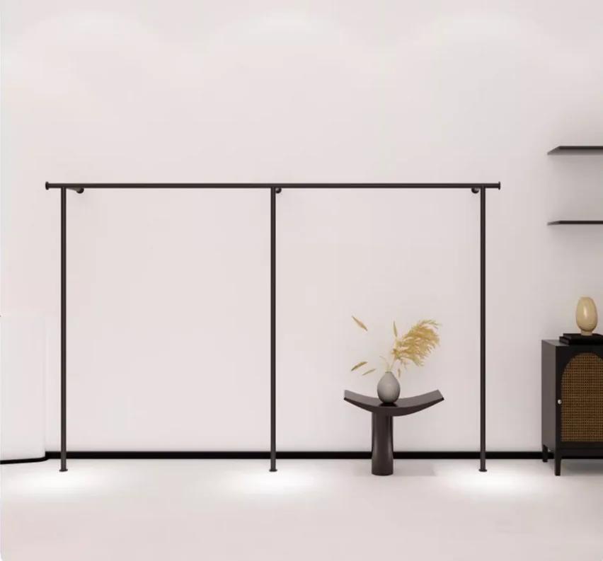 Présentoir mural pour magasin de vêtements