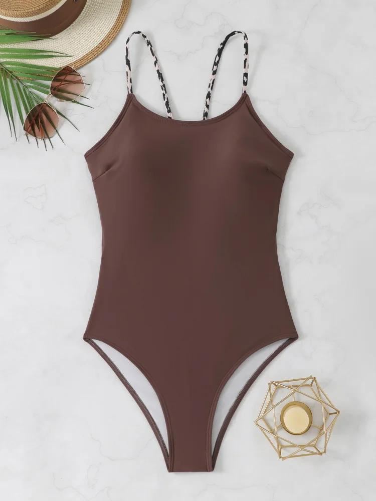 Maillot de bain une pièce femme 2026 - Modèle uni sexy à bretelles et découpes dos nu pour l'été