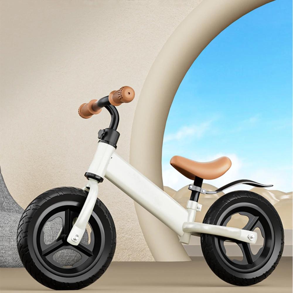 Vélo d'équilibre léger pour enfants avec 360 ° Guidon rotatif antidérapant pour bébé de 2 à 6 ans,