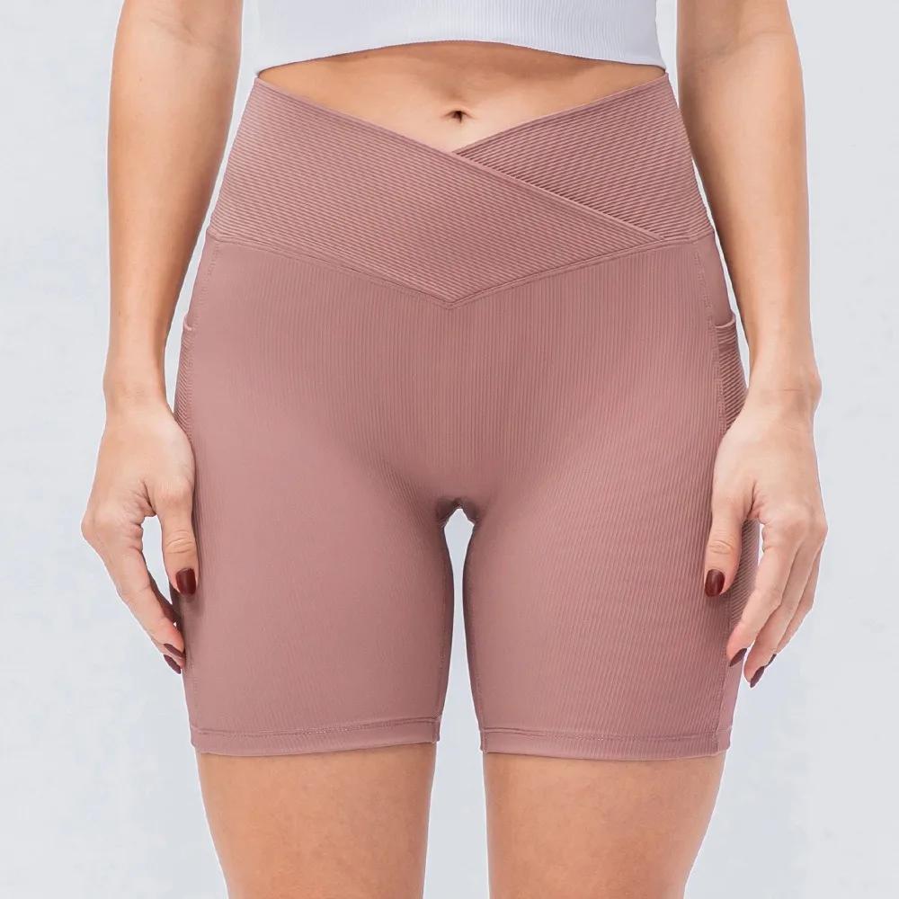 Shorts de yoga taille haute pour femmes avec poches, effet push-up, ajustés pour le fitness et la co