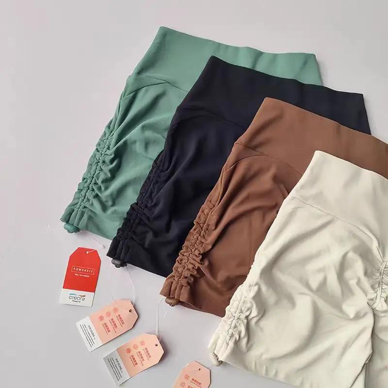 Shorts de yoga taille haute ajustables pour femmes avec cordon de serrage, effet push-up et contrôle