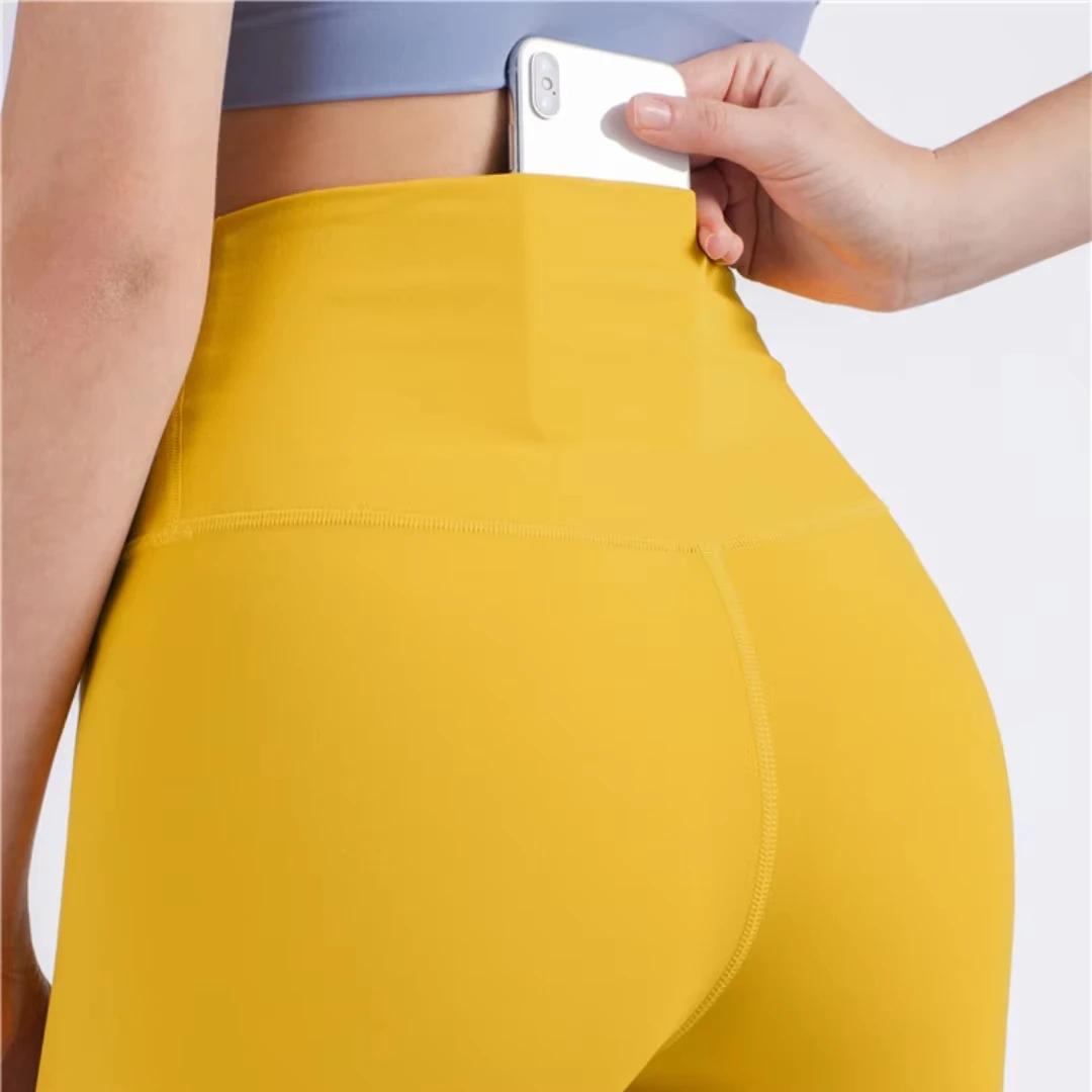 Legging de Yoga taille haute pour femmes, couleur unie, dos doux, poche dans la taille, pantalon de