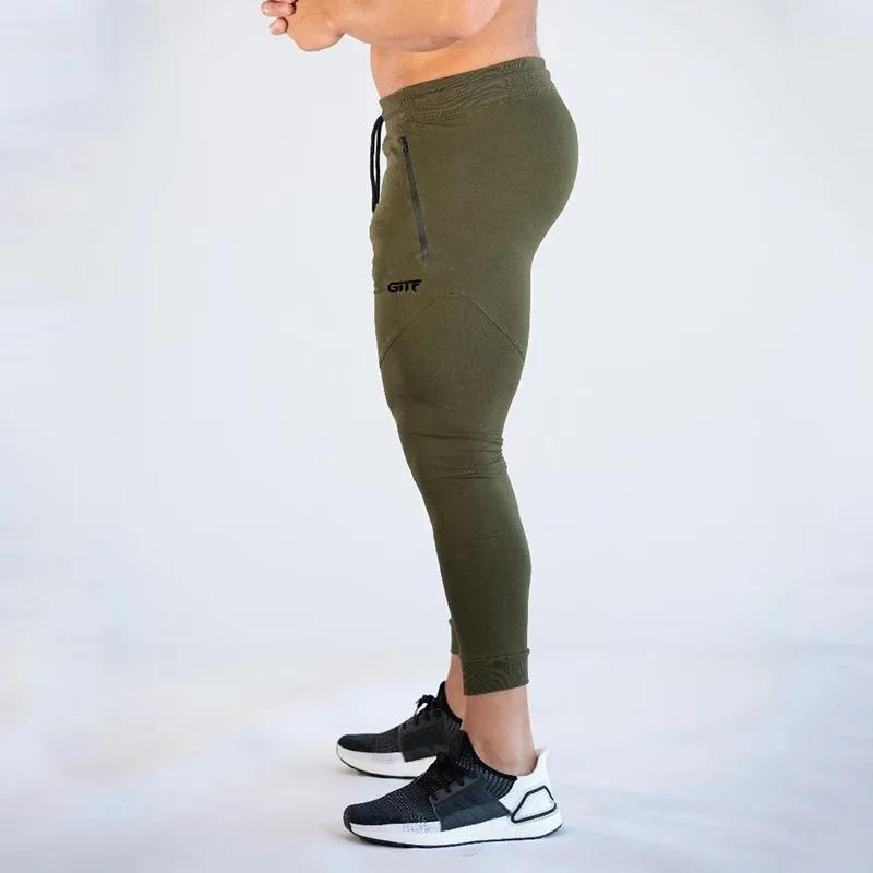 Nouveaux pantalons de course pour hommes pantalons de survêtement de fitness pour hommes collants re