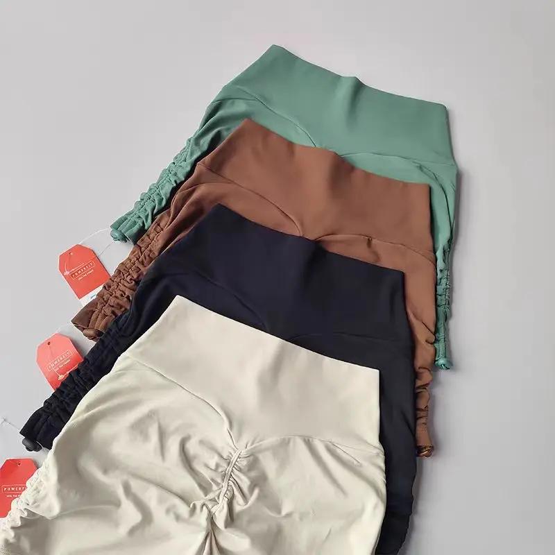 Shorts de yoga taille haute ajustables pour femmes avec cordon de serrage, effet push-up et contrôle