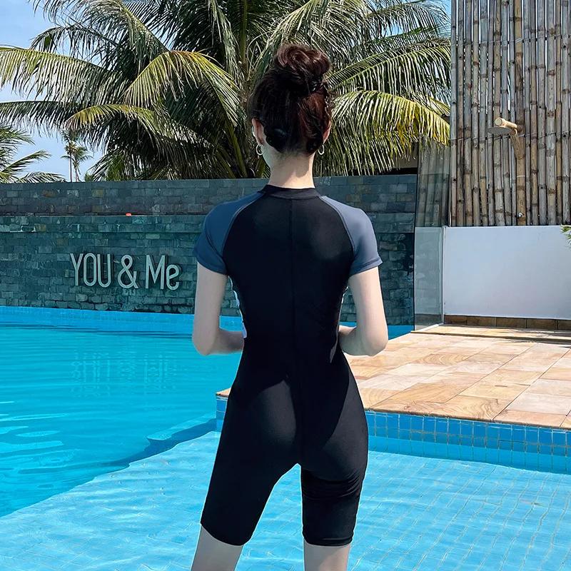 Femmes une pièce imperméable athlétique Protection solaire plage maillot de bain à manches courtes s