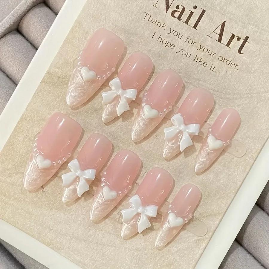 Faux ongles français haut de gamme en forme de cœur, nœud rose, faits à la main, patchs pour ongles