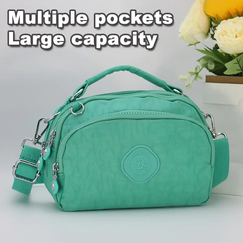 Sac à bandoulière en nylon multi-poches pour femme, sac à main à la mode avec bandoulière amovible.
