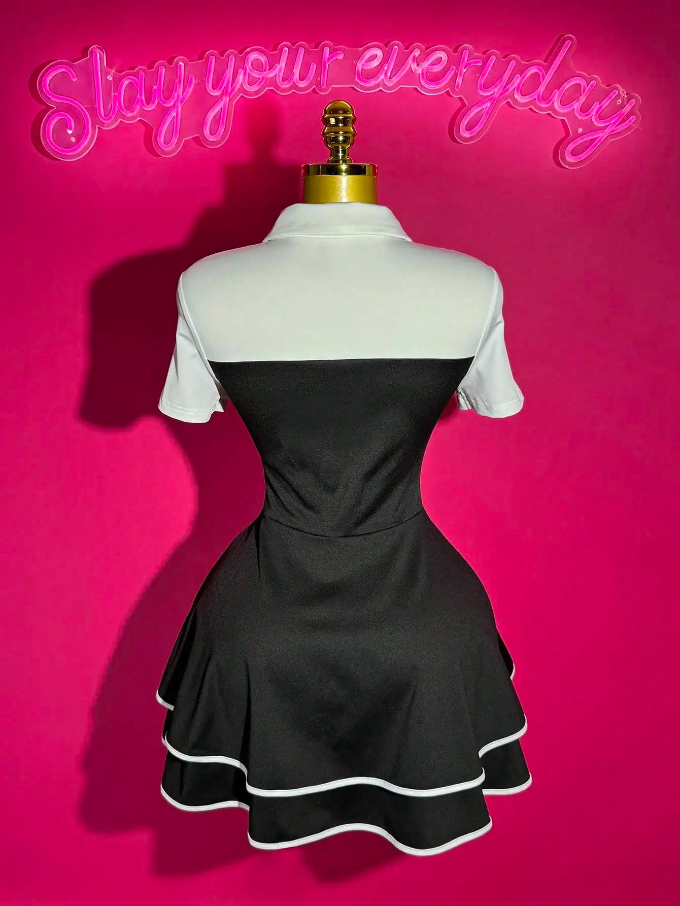 Mini robe bloc de couleur avec nœud papillon et col polo avec ourlet à volants, coupe trapèze pour u