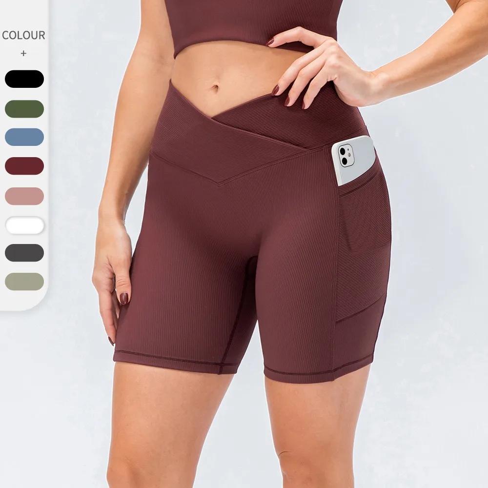 Shorts de yoga taille haute pour femmes avec poches, effet push-up, ajustés pour le fitness et la co