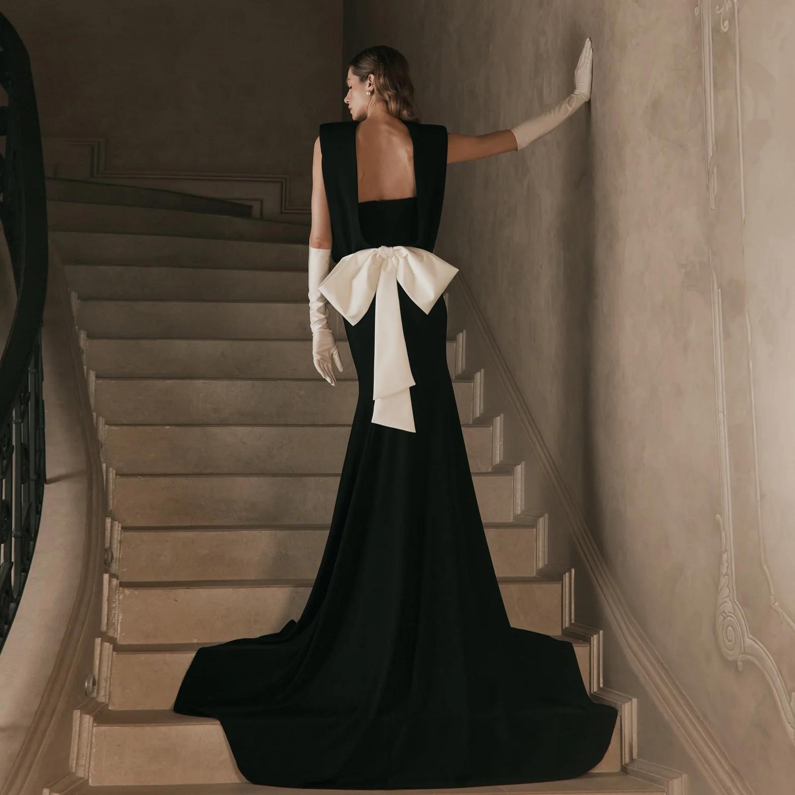 Robe de soirée sirène noire fluide sans dos pour femme, robe de bal longue sans manches avec nœud bl