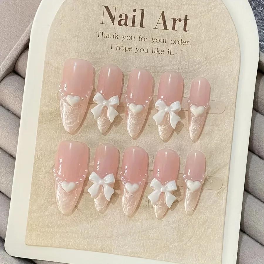 Faux ongles français haut de gamme en forme de cœur, nœud rose, faits à la main, patchs pour ongles