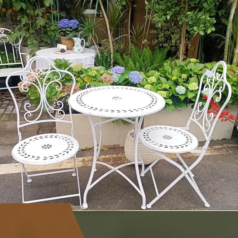 Silla Plegable américain rétro vieux motif creux chaise en fer forgé pliable cour extérieure Villa l