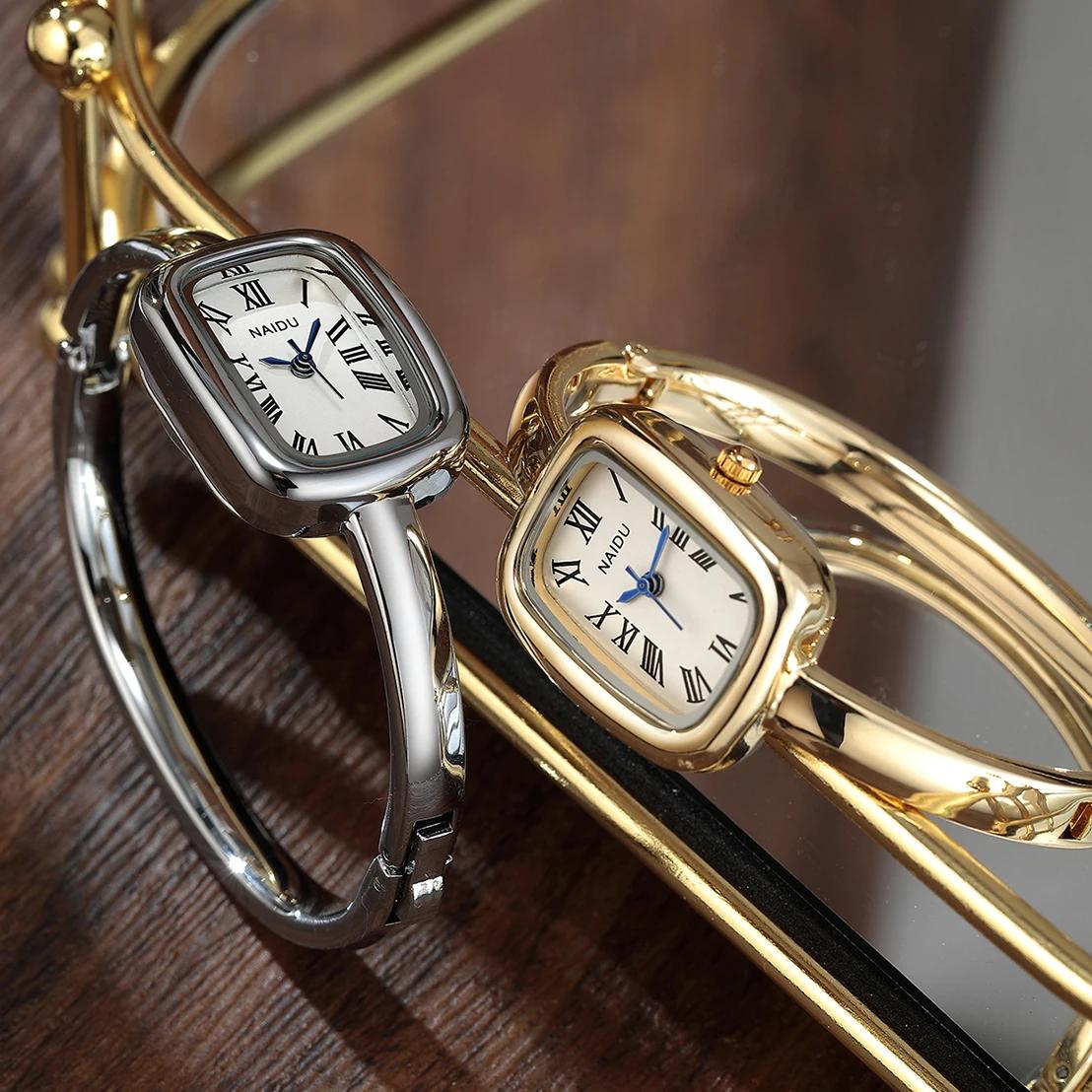 Montre pour femme décontractée, polyvalente, simple et à la mode avec affichage à l'échelle romaine