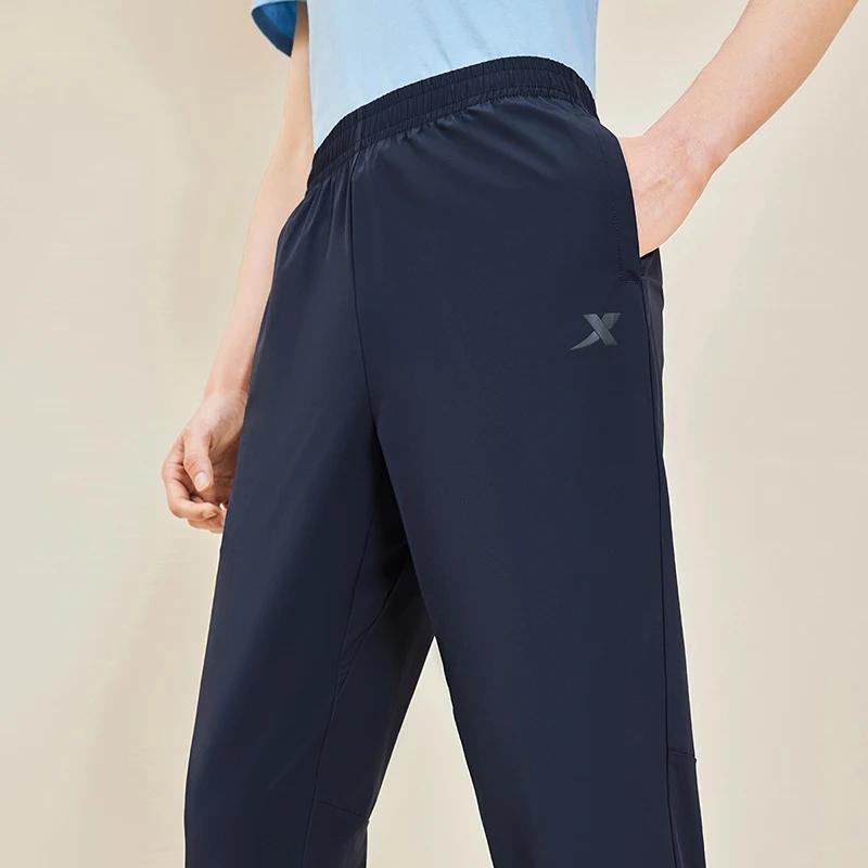 Xtep Little C pantalon pour hommes été pantalon absorbant la sueur à la mode rétro mode bas à séchag