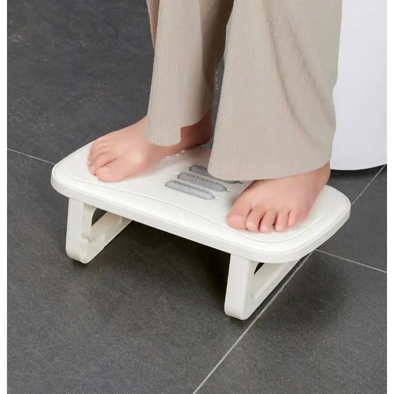 Repose-pieds de bureau pour éviter la croisement des jambes, surface surélevée avec design massant s