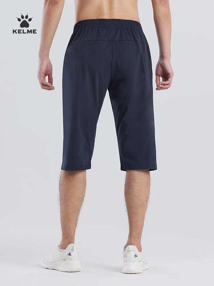 Capris de sport Kelme respirants homme - Short fitness football et course été