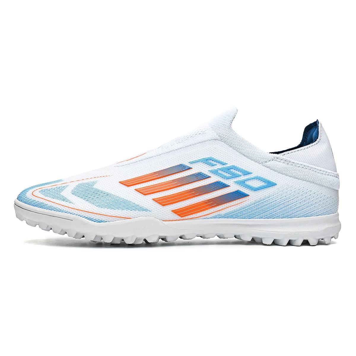 Les chaussures de football pour hommes de sport avec des clous cassés TF offrent une poignée super f