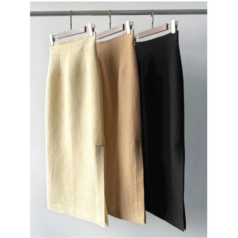 Jupe simple taille haute en lin et laine, atmosphère artistique espagnole, ourlet texturé, fente lat