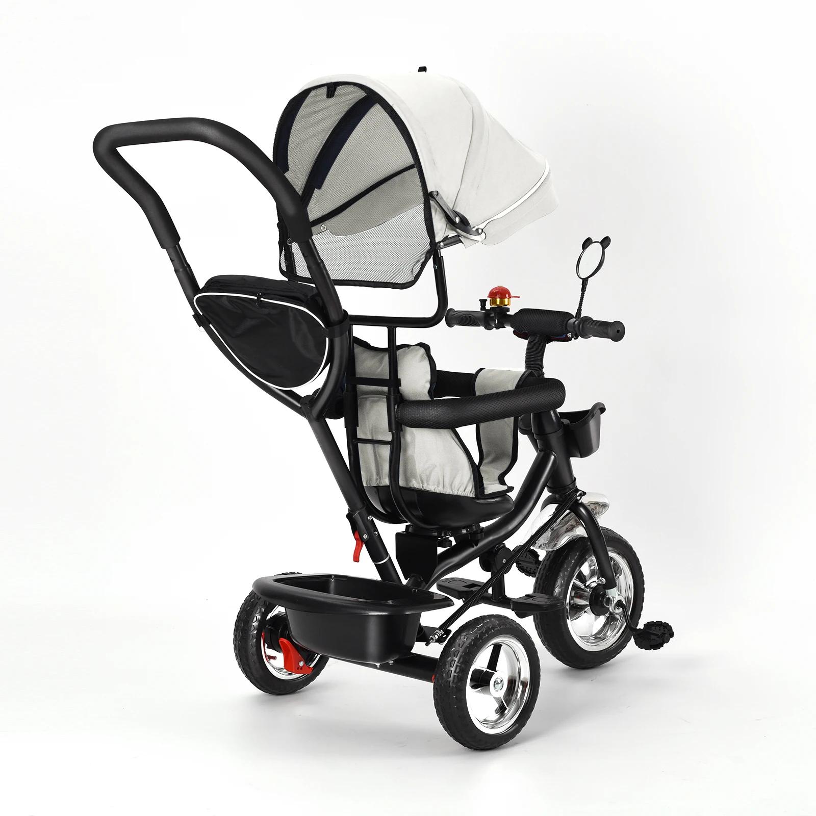 Tricycle avec barre de poussée, siège rotatif, voyage avant et arrière, auvent pliable avec protecti