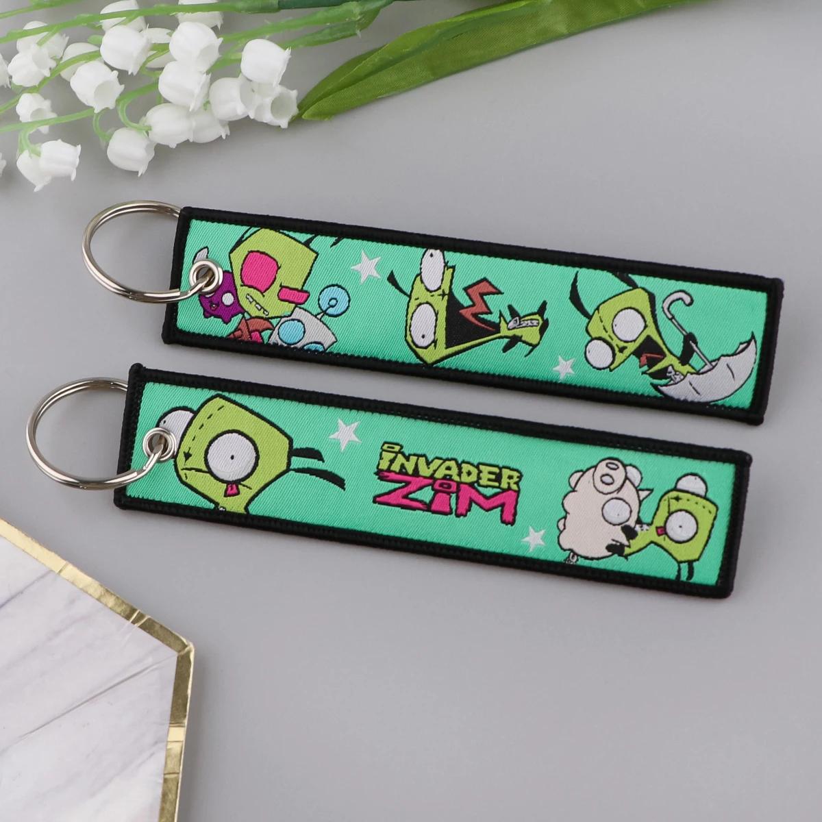 Personnages mignons Jet Tag nouvelle étiquette de clé de broderie porte-clés pour motos voitures sac