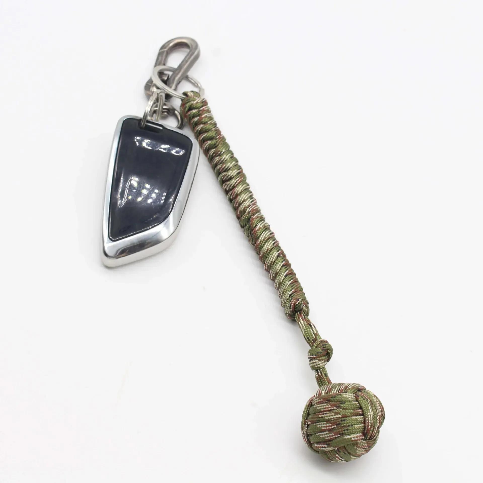 Poinçon de singe, boule en acier, lanière d'auto-défense, porte-clés de survie, fenêtre cassée, cord