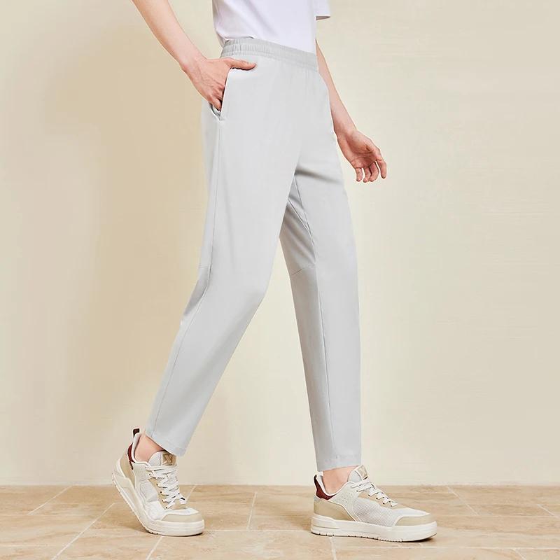 Xtep Little C pantalon pour hommes été pantalon absorbant la sueur à la mode rétro mode bas à séchag