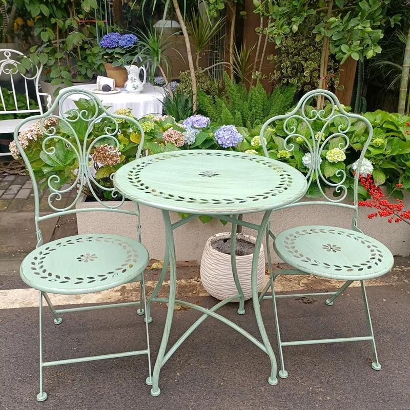 Silla Plegable américain rétro vieux motif creux chaise en fer forgé pliable cour extérieure Villa l