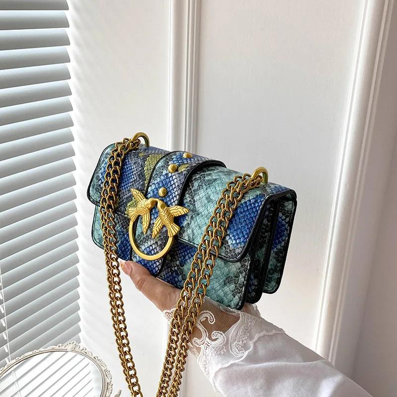 Sac à bandoulière tendance pour femme avec chaîne et blocs de couleur, sac à main élégant à porter s