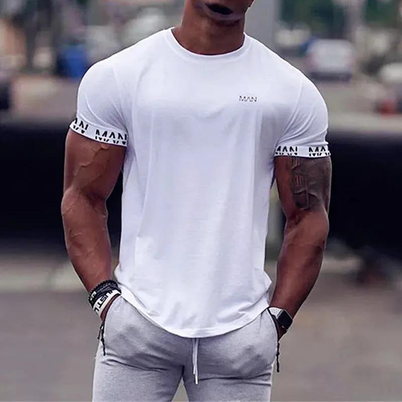 T-shirt compression homme pour gym et course - Haut sportif respirant d'été pour entraînement fitness