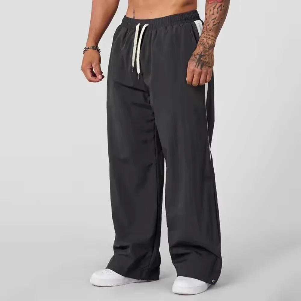 Pantalon de survêtement pour hommes, ample, décontracté, jambes larges, tendance, sport, épissage, respirant, pantalon de sport américain, nouvelle collection automne 2025