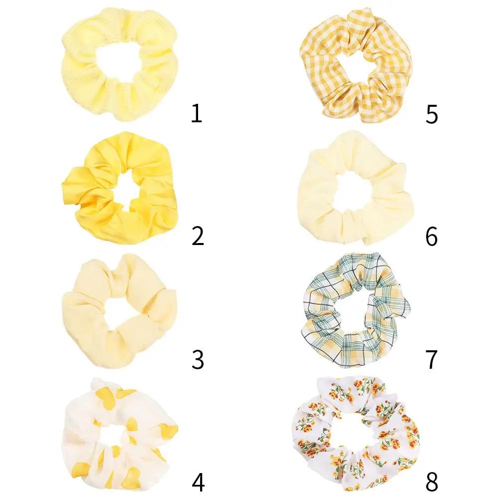 Accessoires capillaires élastiques à motif floral