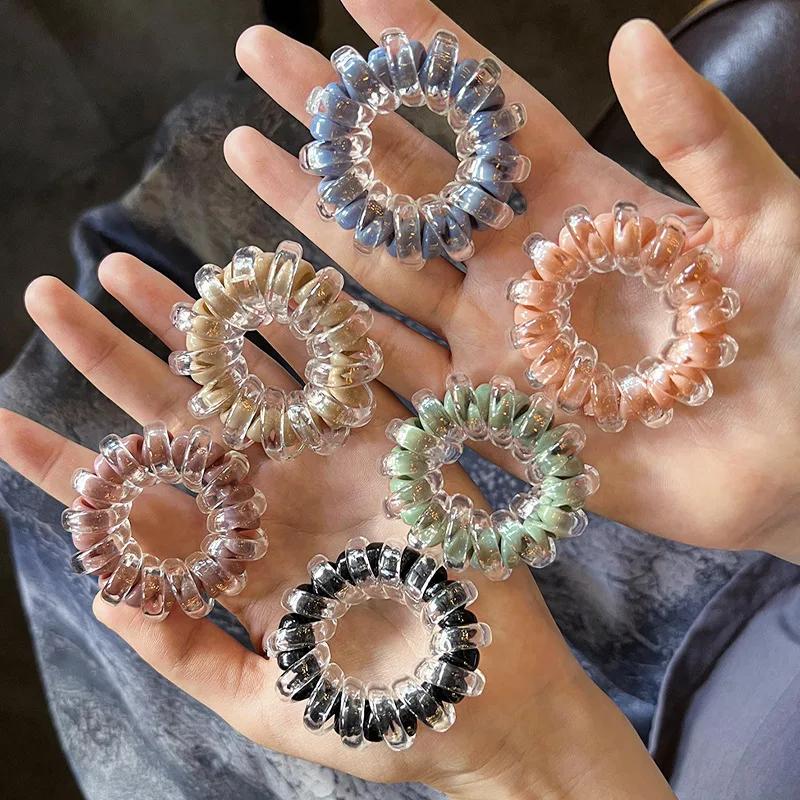 Attache à cheveux élastique en plastique pour femmes