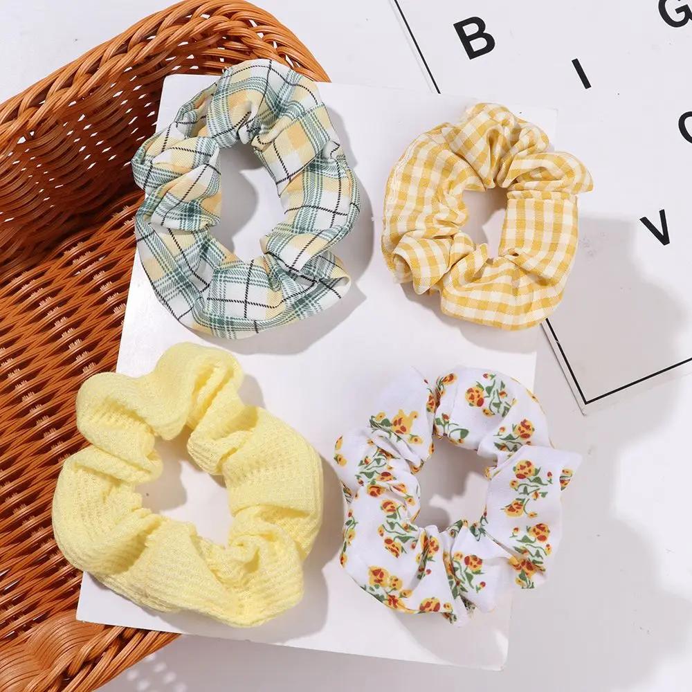 Accessoires capillaires élastiques à motif floral