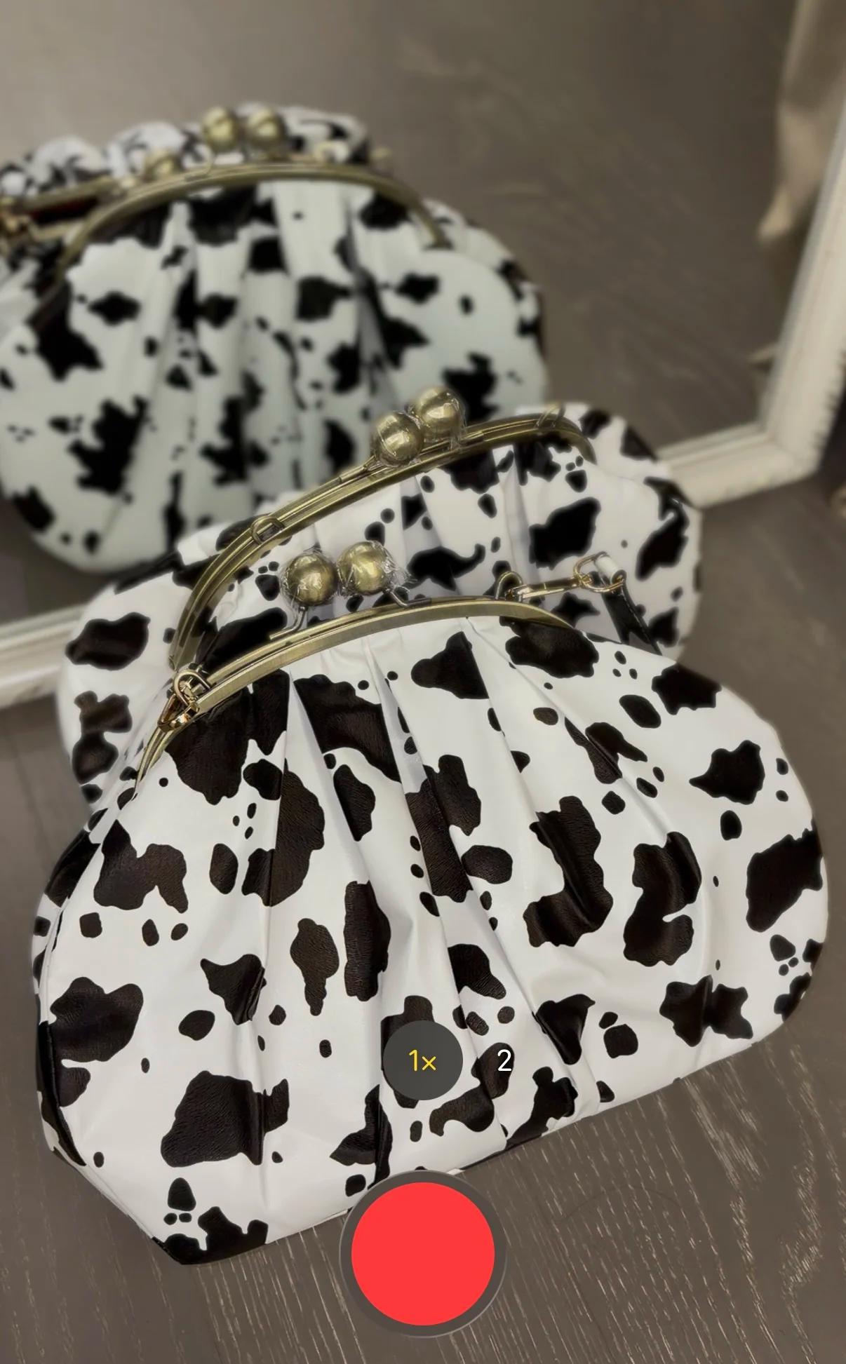 LOST IN VINTAGE – pochette en tissu à motif de vache