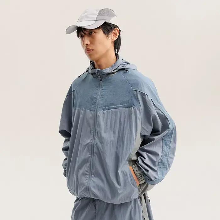 Veste cargo à capuche décontractée et ample pour homme et femme, imperméable, design à empiècements,