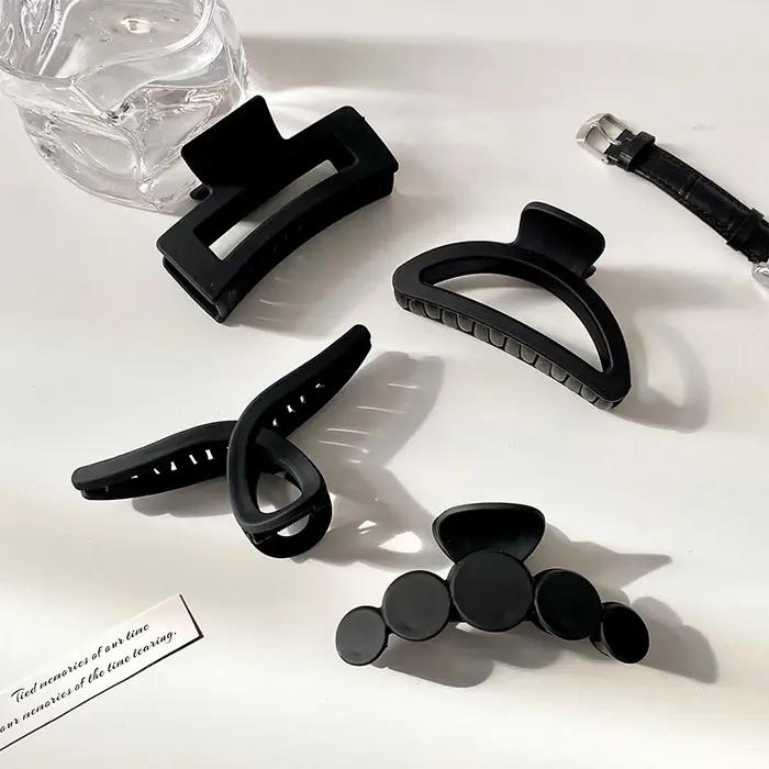 Pince à cheveux élégante noire géométrique en plastique pour femme, support de cheveux longs, pinces