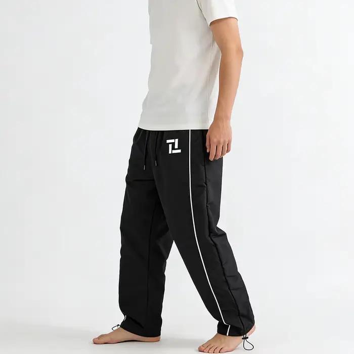 Pantalon de survêtement d'entraînement de fitness pour homme noir avec rayures latérales blanches imprimé géométrique pour sport et loisirs