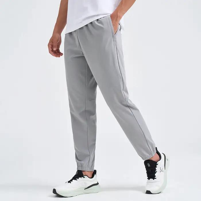 Xtep pantalon pour hommes été pantalon absorbant la sueur à la mode rétro mode bas à séchage rapide