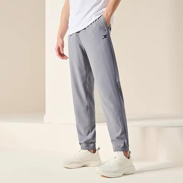Pantalon de survêtement homme été respirant Xtep - Confort sportif quotidien pour activités plein air
