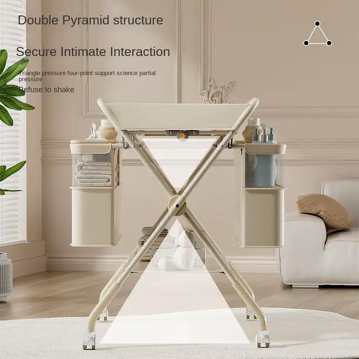 Table à langer pour bébé avec design multifonctionnel pliable, hauteur réglable, construction stable