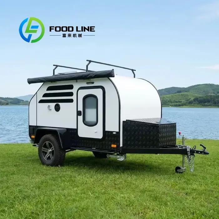 Remorque tout-terrain robuste pour le camping, avec roues larges à forte traction, idéale pour les a